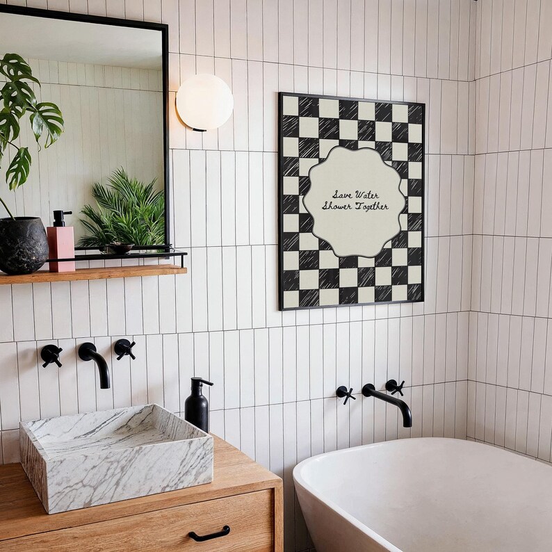 Funny "Save Water, Shower Together" bathroom wall art featuring a hand-drawn red and cream checkered pattern in a retro indie aesthetic.