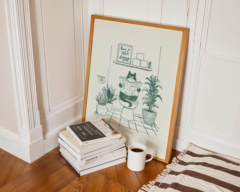Minimal green line art illustration of a cute cat reading a newspaper on a toilet with potted plants and a “Have a Nice Poop” sign, funny bathroom art poster.