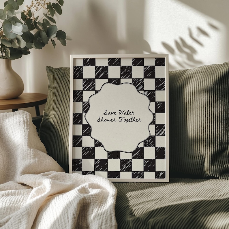 Funny "Save Water, Shower Together" bathroom wall art featuring a hand-drawn red and cream checkered pattern in a retro indie aesthetic.