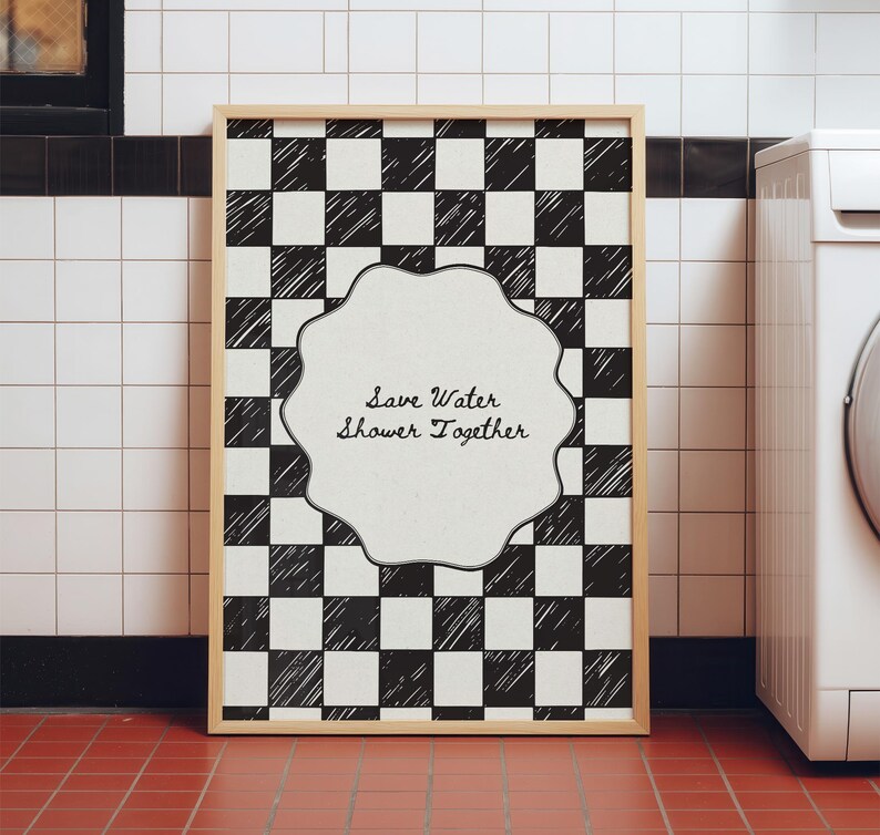 Funny "Save Water, Shower Together" bathroom wall art featuring a hand-drawn red and cream checkered pattern in a retro indie aesthetic.