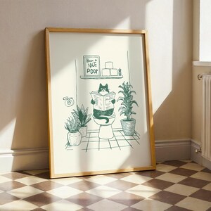 Minimal green line art illustration of a cute cat reading a newspaper on a toilet with potted plants and a “Have a Nice Poop” sign, funny bathroom art poster.