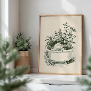 Ink-style drawing of a frog relaxing in a bathtub surrounded by leafy plants, with a soft vintage cottagecore look. Neutral simple art for guest bathroom decor.