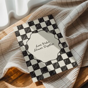 Funny "Save Water, Shower Together" bathroom wall art featuring a hand-drawn red and cream checkered pattern in a retro indie aesthetic.
