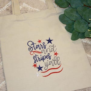 Canvas tote embroidered with stars and stripes flag