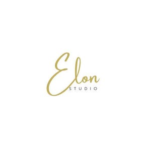 May include: The logo for Elon Studio features elegant, gold-colored script lettering on a white background. The word "Elon" is written in a flowing, cursive style, with "STUDIO" in a smaller, sans-serif font below.