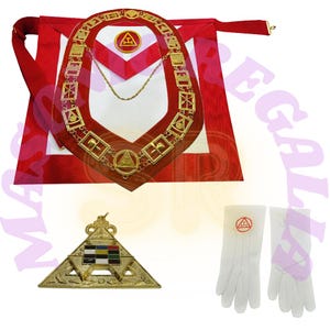 May include: A red and white Masonic apron with a gold chain and pendant. The pendant is a triangle with a compass and square inside. The apron also has a gold collar with a triangle and a compass and square inside. The collar is attached to the apron with a gold chain. The apron is on a red background.