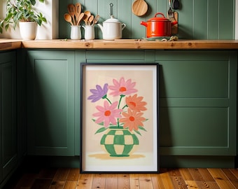 May include: A framed floral art print featuring a bouquet of colorful flowers in a green and white checkered vase. The flowers are pink, orange, and purple, set against a cream background. The artwork is displayed in a black frame.