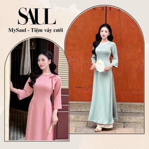 May include: Two women are pictured wearing traditional Vietnamese dresses. One dress is a soft pink, the other a pale green. The dresses have long sleeves and are floor-length. The text "SAUL" and "MySaul - Tiệm váy cưới" is at the top.