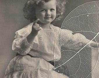 UNUSED Pre 1910 Cute Edwardian Curly Haired Girl Sitting on Table Antique Postcard RPPC