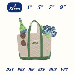 Könnte beinhalten: Gesticktes Tragetaschen-Design mit grünem Griff und Besatz, mit einer Flasche, Sonnenbrille und Blumen. Die Tasche hat die Initialen "JMJ" und ist in den Größen 10 cm, 13 cm, 18 cm und 23 cm erhältlich.