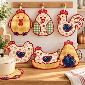 May include: A collection of six quilted fabric pot holders shaped like chickens and roosters, featuring various patterns including yellow gingham, floral prints, and blue polka dots with red trim, hanging from a wooden rack and resting on a counter.