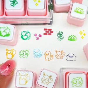 Poke Mon and Scenery mini 6-in-1  pre-inked push button stamps