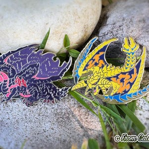 Glow-in-the-Dark Monster Enamel Pins – Gore Magala & Rey Dau