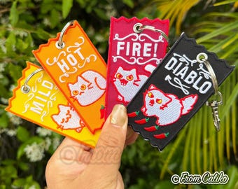 Spicy Kitty Taco Sauce Jet Tags - Spicy Cat Hot Sauce