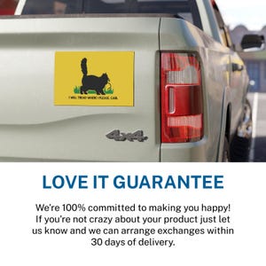 May include: A yellow rectangular magnet featuring a black cat silhouette holding yarn, with the text "I WILL TREAD WHERE I PLEASE, CARL". The magnet is attached to the rear of a silver truck.