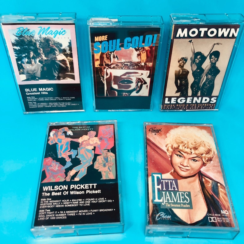 May include: Five vintage cassette tapes featuring music artists. The tapes include "Blue Magic," "More Soul Gold," "Motown Legends," "The Best of Wilson Pickett," and "Etta James: The Sweetest Peaches." Each tape has unique cover art and text, with clear plastic cases.
