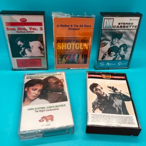 May include: Five vintage cassette tapes featuring various artists and albums. Titles include "Soul Hits, Vol. 2," "Shotgun," "The Motown Sound," "The Right Combination," and "The Jackie Wilson Story." The tapes are in clear plastic cases, with album art visible.