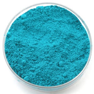 Verdigris pigment, a vibrant blue-green made from copper acetate, historically prized for its intense hue and transparency. Used in oil, watercolor, and tempera painting, it offers brilliant color but requires careful handling due to moderate lightfastness. Favored by Renaissance artists for glazing and decorative arts. Finely ground for professional-quality applications. Available in various sizes.