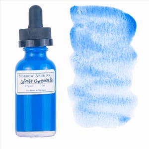 May include: A cobalt blue glass bottle with a black dropper and a white label that reads "Morrow Archival Cobalt Chromite B". A swatch of light blue watercolor paint is next to the bottle. Handmade in Michigan.
