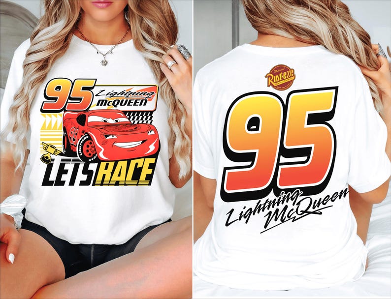 May include: White t-shirt featuring Lightning McQueen from the Cars movie. The front graphic includes the number 95, the character's name, and the phrase "Let's Race." The back of the shirt displays a large number 95 and the character's name.