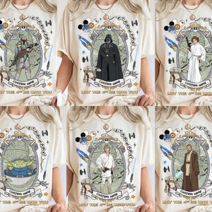 May include: Off-white t-shirts with Star Wars characters including Boba Fett, Darth Vader, and Princess Leia. Each shirt has a framed graphic with the text "STAR WARS" and "MAY THE 4TH BE WITH YOU".