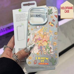 May include: A clear iPhone 14 Pro case featuring a colorful collage of illustrated characters and icons including cacti, stars, and musical notes. The text "I KNEW IT" and "I KNEW YOU" is printed on the lower section, with "SO COOL" near the camera cutout.