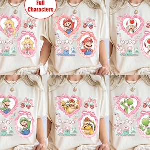 Maglietta con i personaggi del film Super Mario Galaxy e fiocco cocchi, maglietta Super Mario Luigi Peach Princess Trip, Universal World immagine 1