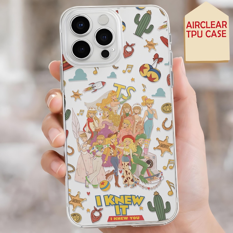May include: A clear TPU phone case featuring a colorful collage of cartoon characters and western-themed icons like cacti, sheriff stars, and rockets. The text "TS" appears at the top, and "I KNEW IT I KNEW YOU" is printed near the bottom.