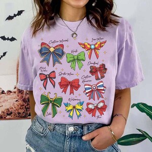 スーパーヒーローにインスパイアされたコケットボウシャツ、スーパーヒーローコケットシャツ、マーベルスーパーヒーローコケットTシャツ、ディズニーマーベルファミリーマッチングシャツ 画像 5