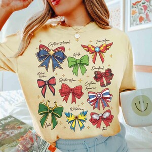 スーパーヒーローにインスパイアされたコケットボウシャツ、スーパーヒーローコケットシャツ、マーベルスーパーヒーローコケットTシャツ、ディズニーマーベルファミリーマッチングシャツ 画像 6