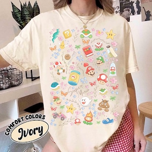 Camiseta vintage con el icono de Super Mario, lazo coqueto y estampado floral, camiseta "Best Day Ever", camiseta de Super Mario, camiseta para viaje a Universal World, camiseta de Universal Studios