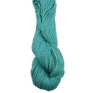 May include: A skein of teal-colored yarn, tightly twisted and textured. The yarn appears thick and chunky, suitable for knitting or crocheting projects. The color is a vibrant, solid teal, ideal for various crafting applications.
