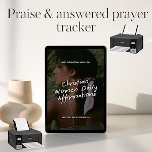 May include: An image featuring a tablet displaying "Christian Women Daily Affirmations" with the text "Praise & answered prayer tracker." Two printers and a vase are also visible. The tablet screen includes the text "HAPPY INTERNATIONAL WOMEN'S DAY."