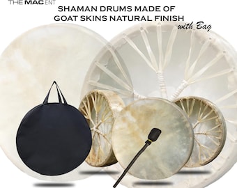 May include: Shaman drums made of goat skins with a natural finish. The image shows several drums, a drumstick, and a black carrying bag. The drums have a light tan colour and are round. The text "SHAMAN DRUMS MADE OF GOAT SKINS NATURAL FINISH with Bag" is visible.