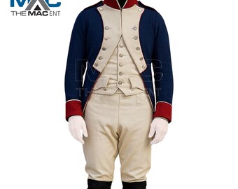 May include: A navy blue military-style jacket with red trim, paired with a cream-colored vest and pants. The jacket features silver buttons and a high collar. The logo "MAC THE MACENT" is in the top left corner.