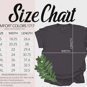 May include: A size chart for a Comfort Colors 1717 unisex heavyweight t-shirt. The chart displays sizes S through 4XL with corresponding width and length measurements in inches. A dark grey t-shirt is shown with lines indicating width and length.