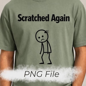 Könnte beinhalten: Salbeigrünes T-Shirt mit dem Text "Scratched Again" über einer Strichmännchenfigur mit traurigem Gesicht. Darunter steht "PNG File".