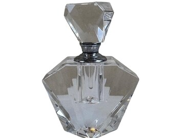Tapón de botella de perfume con forma de diamante facetado, decorativo y atomizador.