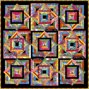 May include: A colourful quilt with a geometric pattern of squares and diamonds. The quilt is made up of many different fabrics, including floral prints, stripes, and solids. The quilt is framed with a black border and a gold trim.