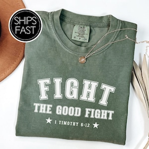 1 Timothy 6:12 Game Day Gift for Her Him Christian T Shirt Custom Bible Verse Fight The Good Fight Comfort Colors® Personalised Sports Gift