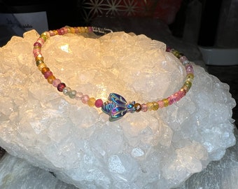 Multicolor Tourmaline with Rainbow Titanium Aura Bumblebee bracelet.Multicolor Tourmaline expands, one’s awareness. Purifies and strengthens