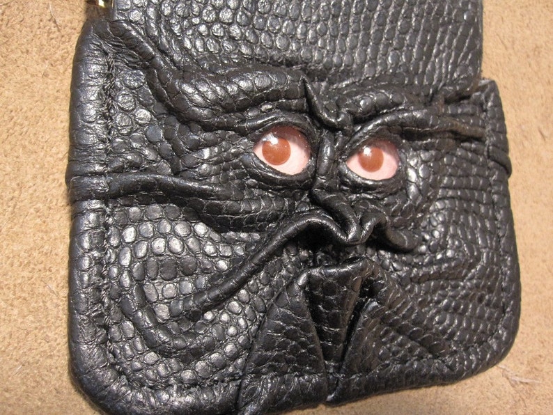 Grichels leather pinch style coin purse scaly black with pink and red albino eyes