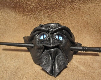 Grichels leather hair thing stick barrette - black with blue slit pupil nova eyes