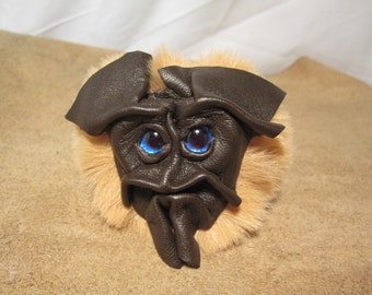 Grichels fake fur puffball keychain - dark brown with cobalt blue eyes