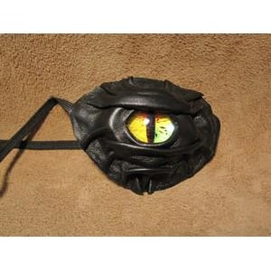 May include: Black leather eye patch with a large, detailed eye design. The eye features yellow, orange, and green coloring. The eye patch has a strap for securing it to the head. The product is likely for cosplay or costume use.
