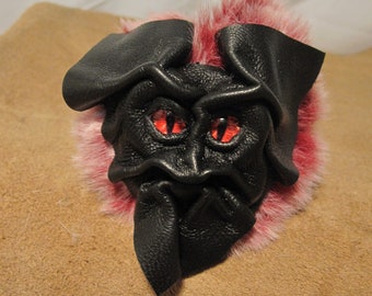 Grichels fake fur puffball keychain - black with red slit pupil nova eyes