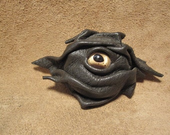 Grichel leather magnet - very dark brown with gold fish eye