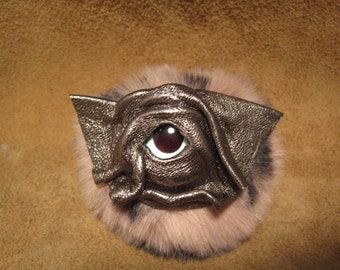 Grichels fake fur puffball keychain - metallic silver blue with blue edged white big pupil eye