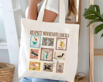 May include: Off-white tote bag with a design of vintage-style postage stamps featuring Minnesota themes. The text "RESPECT MINNESOTA LOCALS" is printed above the stamps. The stamps depict flowers, birds, and other imagery.
