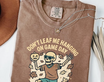 Funny Skeleton Football Shirt, Dont Leaf Me Hanging on Game Day, Halloween Tailgate Dad Shirt, Fall Sports shirt, Spooky Football Tee